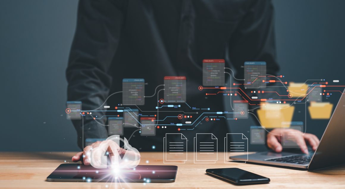 "person-is-using-tablet-laptop-work-project-scaled"/