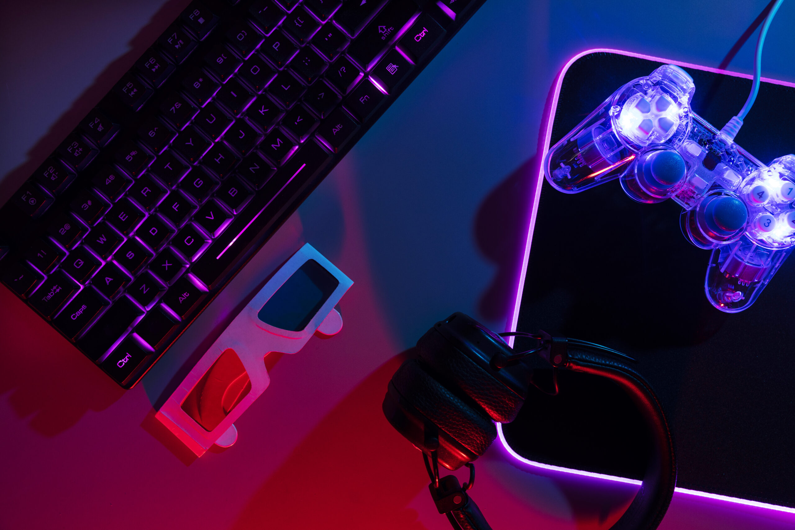 view-illuminated-neon-gaming-keyboard-setup-controller